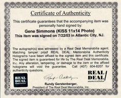 Gene Simmons signed KISS 11x14 concert photo (Real Deal) - AutographsForSale.com