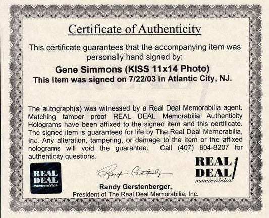 Gene Simmons signed KISS 11x14 concert photo (Real Deal Memorabilia) - AutographsForSale.com
