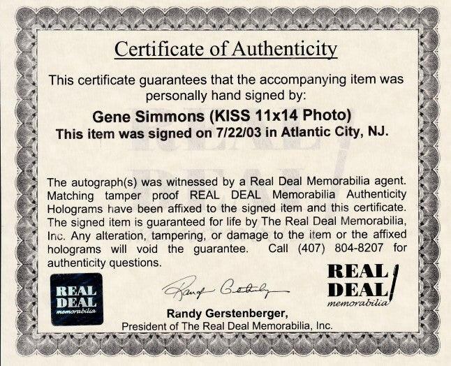 Gene Simmons signed KISS 11x14 concert photo (Real Deal Memorabilia) - AutographsForSale.com