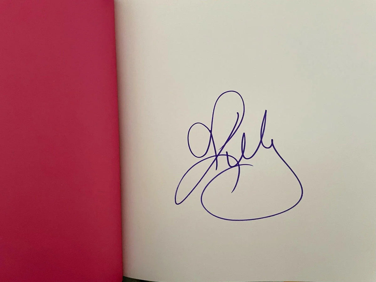 Kelly Clarkson signed River Rose & Magic Lullaby book - AutographsForSale.com