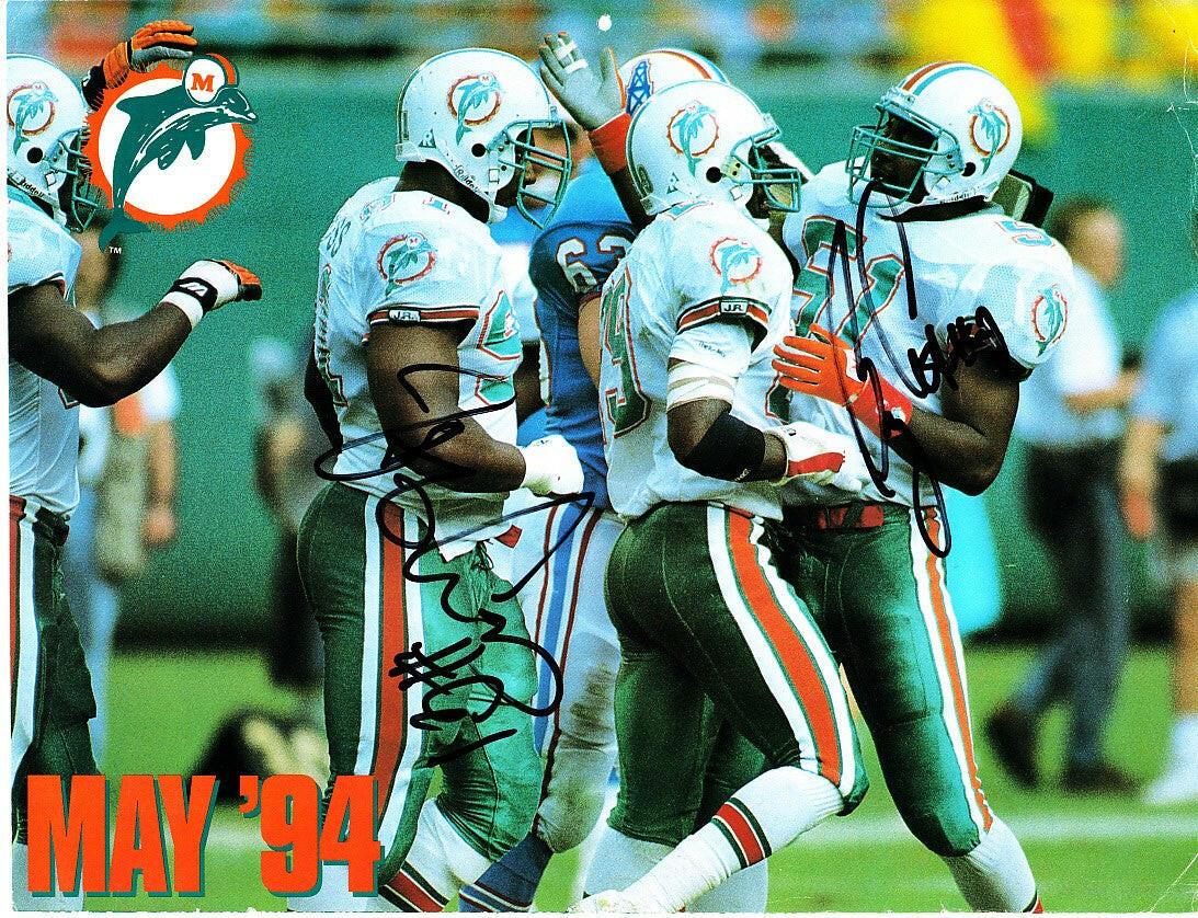 Bryan Cox & Jeff Cross signed Dolphins 1993 1994 calendar photo - AutographsForSale.com