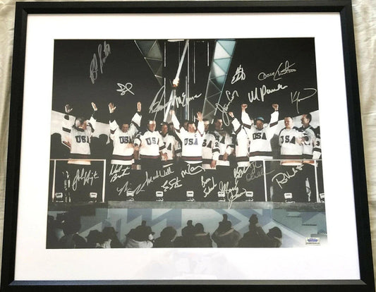 1980 Miracle on Ice USA Hockey Team autographed 2002 Olympic Torch 16x20 photo framed - AutographsForSale.com