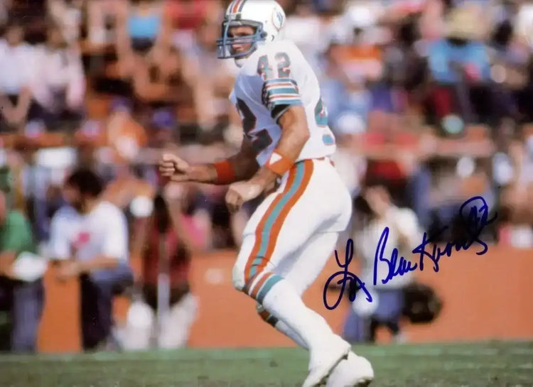 Lyle Blackwood signed 1984 Miami Dolphins calendar photo - AutographsForSale.com