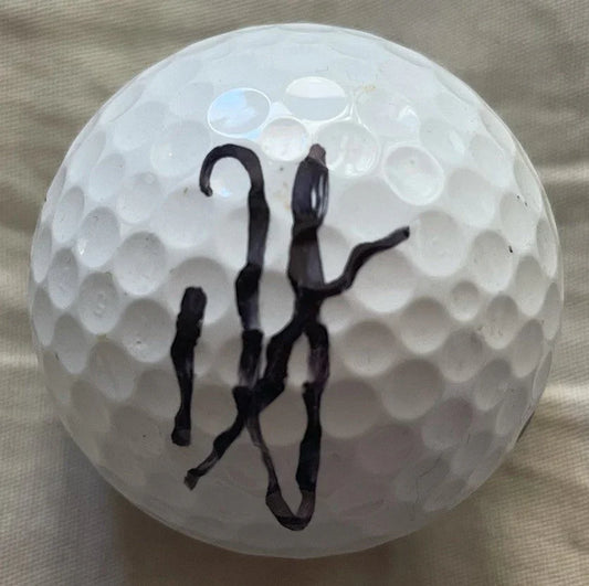 Dustin Johnson autographed Nike golf ball (shorthand signature) - AutographsForSale.com