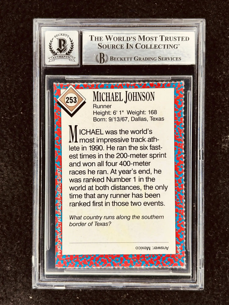 Michael Johnson autographed 1991 Sports Illustrated for Kids Rookie Card BAS graded 9 - AutographsForSale.com