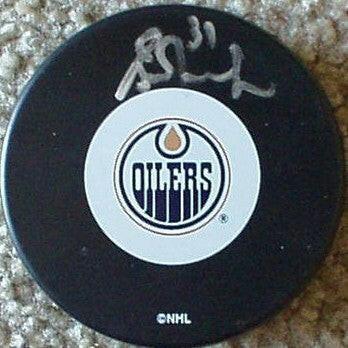 Grant Fuhr autographed Edmonton Oilers puck - AutographsForSale.com