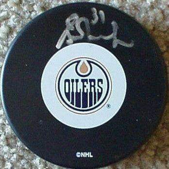 Grant Fuhr autographed Edmonton Oilers puck - AutographsForSale.com