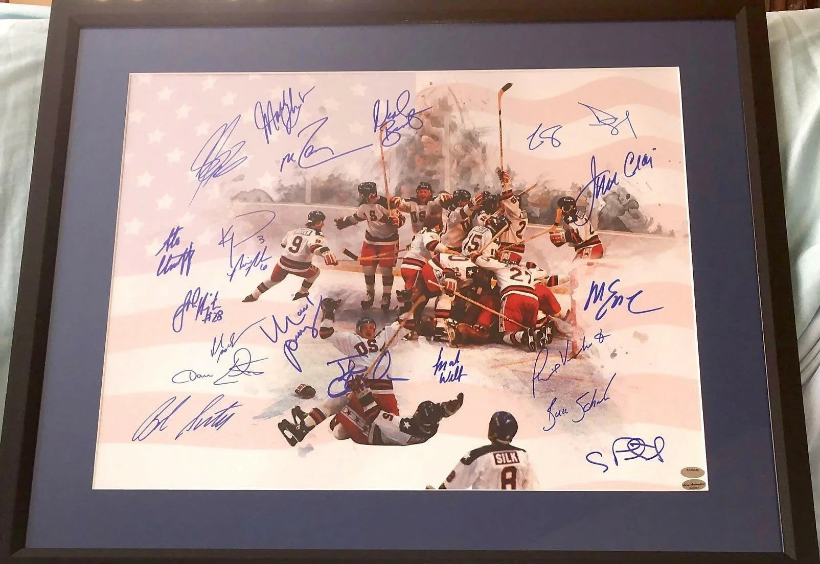 1980 Miracle on Ice USA Olympic Hockey Team autographed 16x20 poster size photo framed (LEAF) - AutographsForSale.com