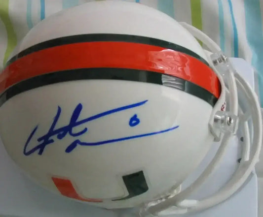 Santana Moss autographed Miami Hurricanes mini helmet - AutographsForSale.com