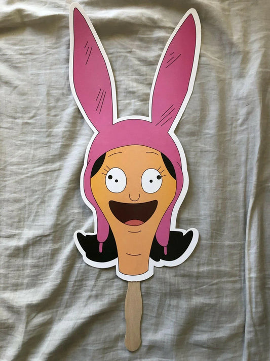 Bobs Burgers Louise Belcher 2018 SDCC fan mask on a stick - AutographsForSale.com
