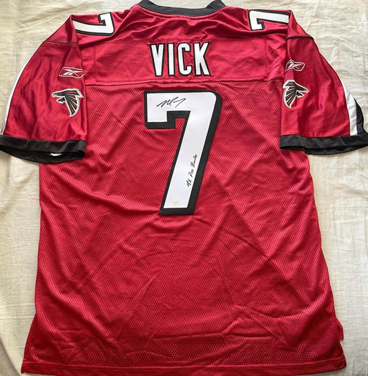 Michael Vick signed Atlanta Falcons Reebok red jersey w/ 4X Pro Bowler Schwartz - AutographsForSale.com