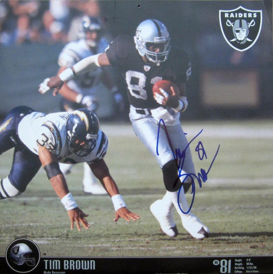Tim Brown autographed Oakland Raiders 2004 calendar photo - AutographsForSale.com
