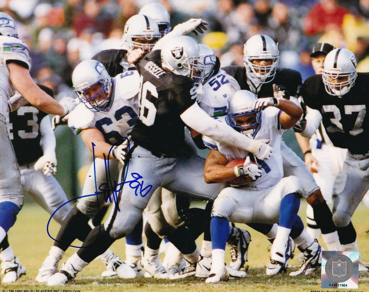 Darrell Russell autographed Oakland Raiders 8x10 photo - AutographsForSale.com
