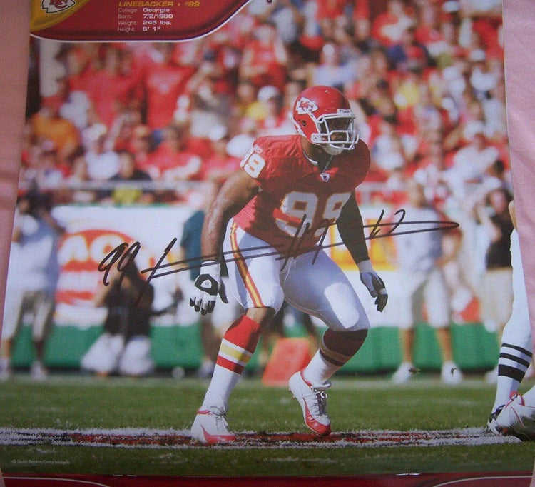 Kendrell Bell autographed Kansas City Chiefs calendar photo - AutographsForSale.com