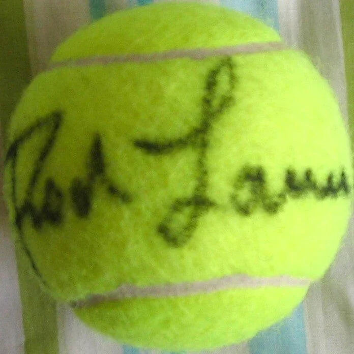 Rod Laver autographed tennis ball - AutographsForSale.com
