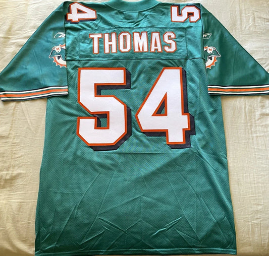 Zach Thomas Miami Dolphins 2002 to 2007 authentic Reebok stitched aqua jersey NEW - AutographsForSale.com
