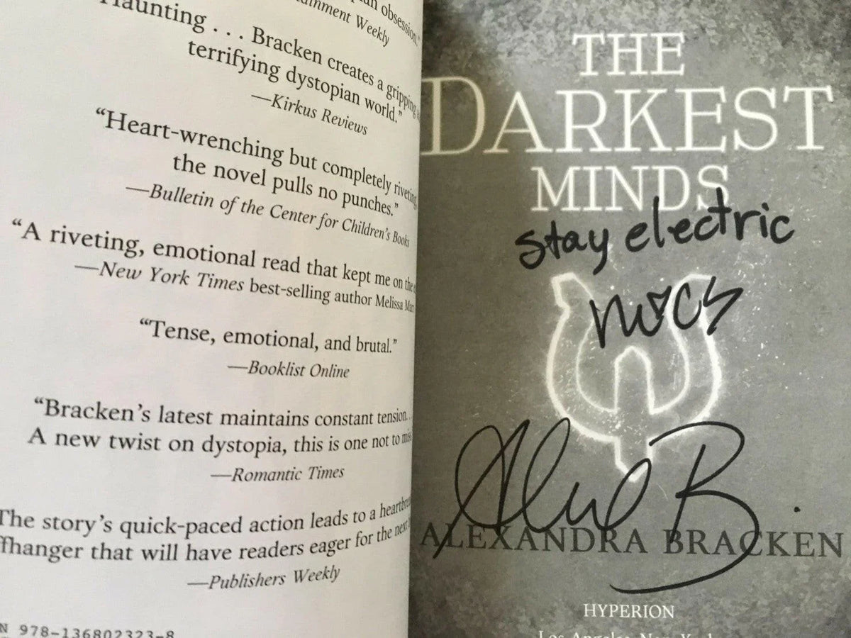 Alexandra Bracken & Miya Cech signed Darkest Minds Movie Edition book - AutographsForSale.com