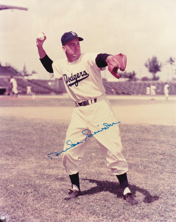 Duke Snider autographed Brooklyn Dodgers 8x10 throwing photo - AutographsForSale.com