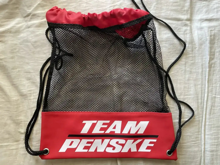 Team Penske drawstring mesh red & black backpack NEW - AutographsForSale.com