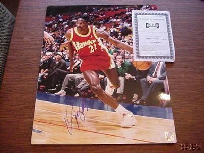 Dominique Wilkins signed Atlanta Hawks 16x20 poster or photo - AutographsForSale.com
