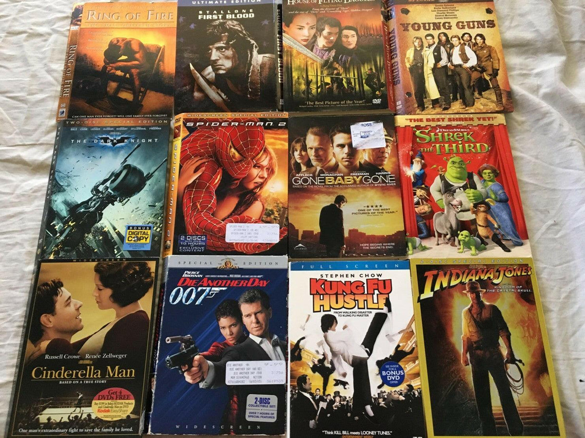 24 DVD movie slipcovers AVP Cinderella Man Dark Knight 1st Blood Prestige True Romance Young Guns - AutographsForSale.com