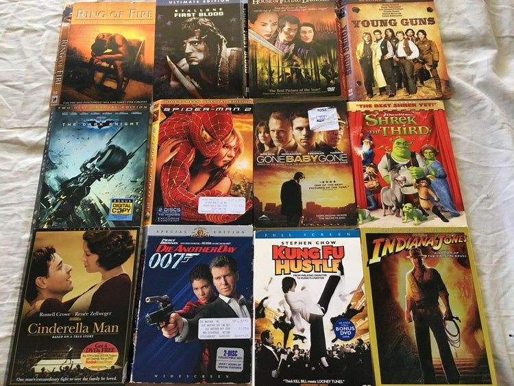 24 DVD movie slipcovers AVP Cinderella Man Dark Knight 1st Blood Prestige True Romance Young Guns - AutographsForSale.com