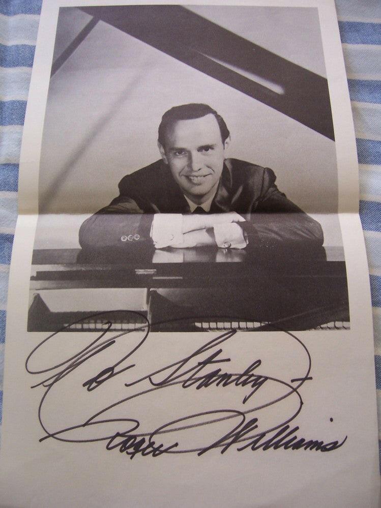 Roger Williams signed B&W photo mini poster To Stanley - AutographsForSale.com