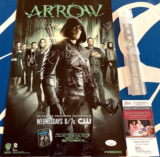 Arrow cast autographed 2014 Comic-Con poster (Stephen Amell David Ramsey Paul Blackthorne Willa Holland) JSA - AutographsForSale.com
