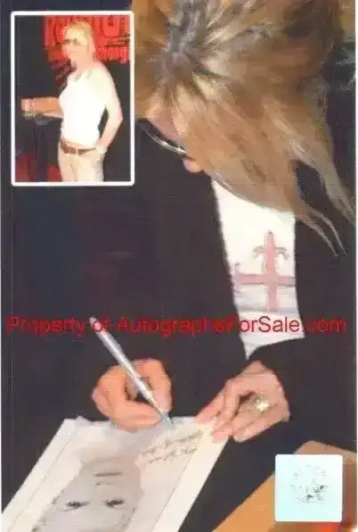 9b5bcda9666c87ce2eb926098d2ef265 - AutographsForSale.com