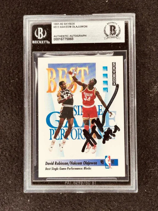 Hakeem Olajuwon signed Rockets 1991-92 SkyBox card BAS certified - AutographsForSale.com