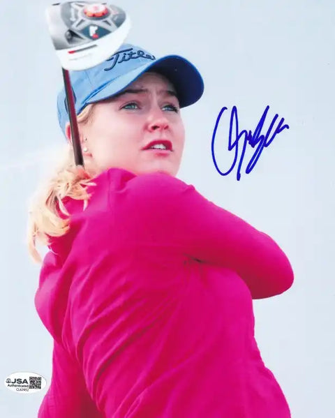 Signed golf photo of player in pink shirt and Titleist cap, JSA authenticated autograph