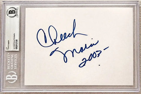Certified autograph index card with blue ink signature and Beckett authentication label