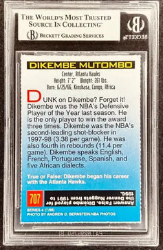 Dikembe Mutombo signed Atlanta Hawks 1998 SI for Kids card BAS slab - AutographsForSale.com