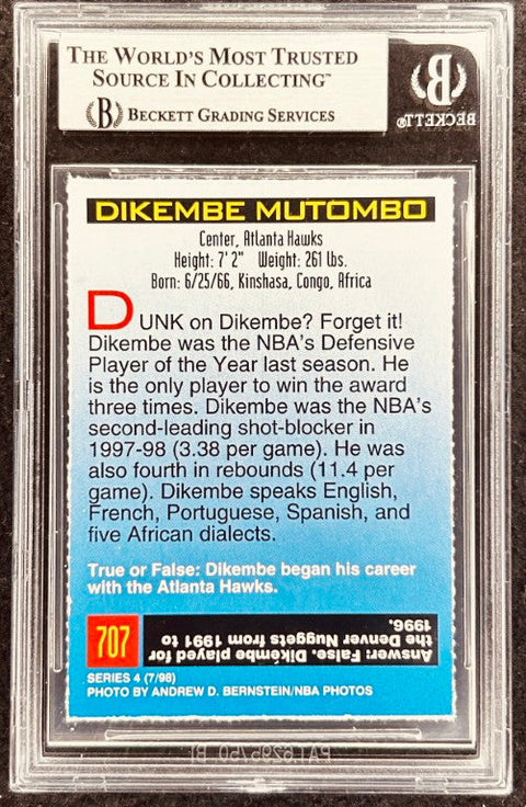 Dikembe Mutombo signed Hawks 1998 SI for Kids card BAS (back)