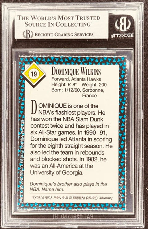 Dominique Wilkins signed Hawks 1992 SI for Kids card BAS (back)