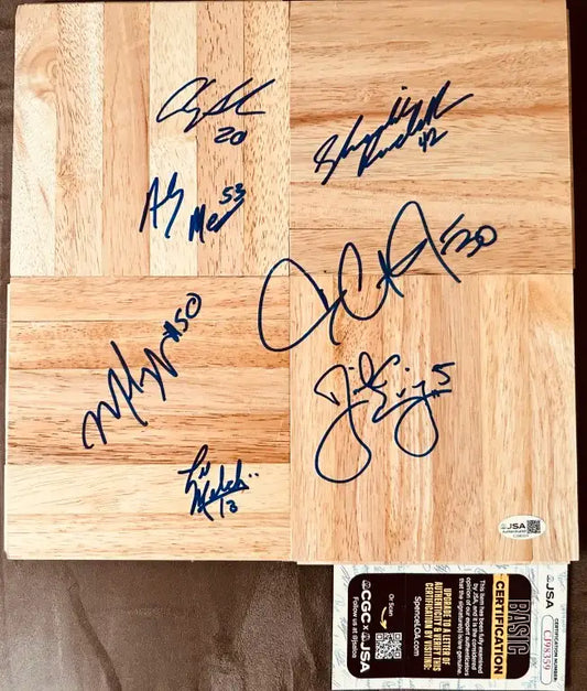 Signed Duke basketball floorboard with multiple autographs and JSA authentication card
