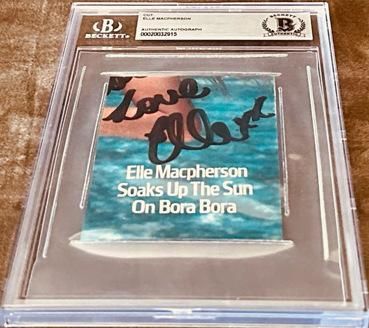 Beckett slabbed Elle Macpherson authentic autograph cut card with Bora Bora ocean background