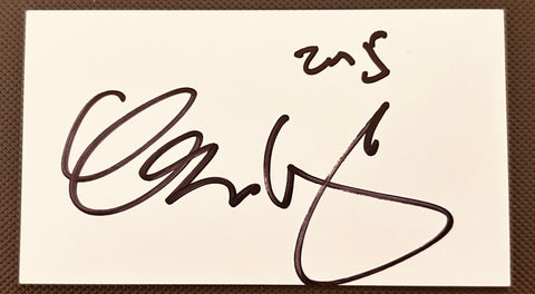 Authentic autograph signature on white card, dark ink, sports memorabilia collectible item