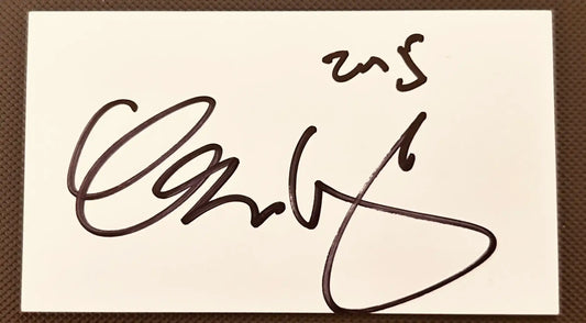 Authentic autograph signature on white card, dark ink, sports memorabilia collectible item