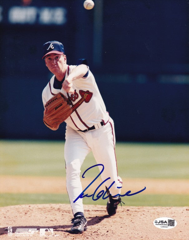 Atlanta Braves pitcher throwing baseball, in-game action photo with autograph, JSA authenticated