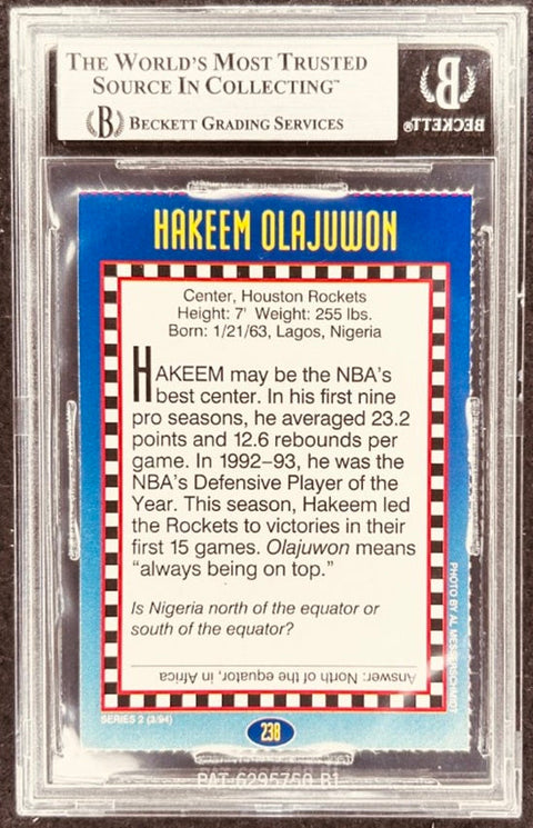 Hakeem Olajuwon signed Rockets 1994 SI for Kids card BAS (back)