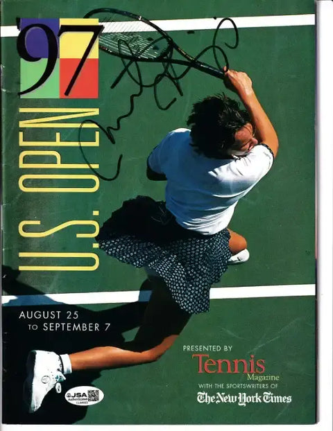 Signed 1997 U.S. Open Tennis Magazine cover featuring player in action, authenticated by JSA
