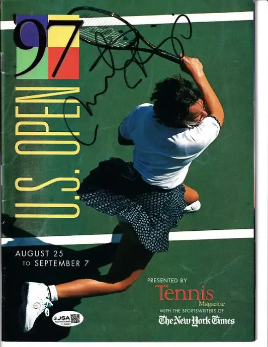 Signed 1997 U.S. Open Tennis Magazine cover featuring player in action, authenticated by JSA