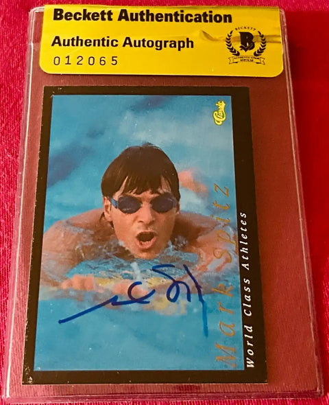 Signed Mark Spitz swimming trading card, Beckett authenticated, blue ink autograph