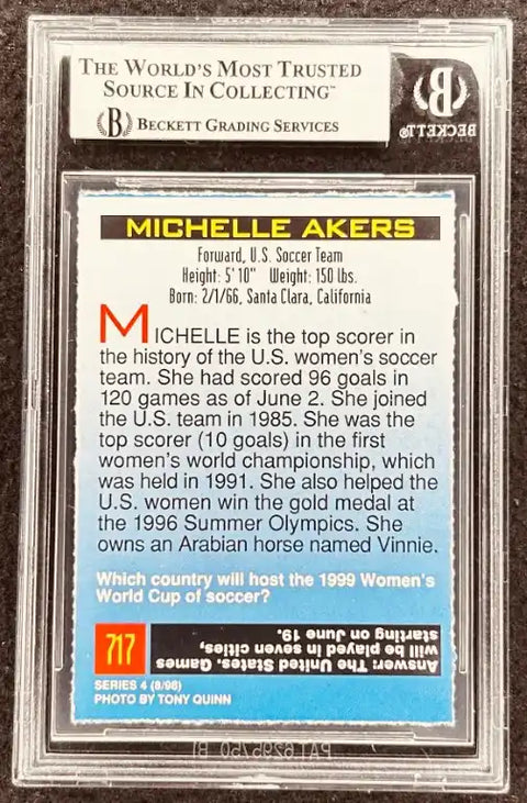 Michelle Akers U.S. Soccer Team autographed trading card, Beckett graded, featuring stats and career highlights.
