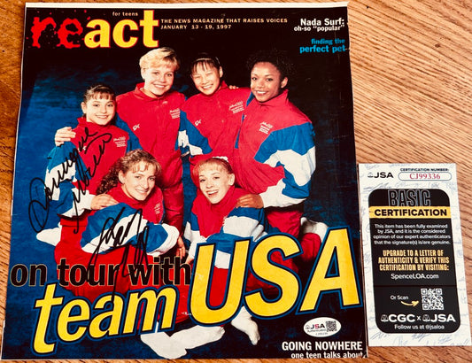 Signed 1997 magazine cover featuring USA women's gymnastics team in red, white, and blue tracksuits with authentication card.