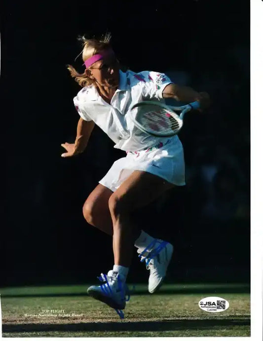 Martina Navratilova in action on tennis court, signed photo with JSA authentication
