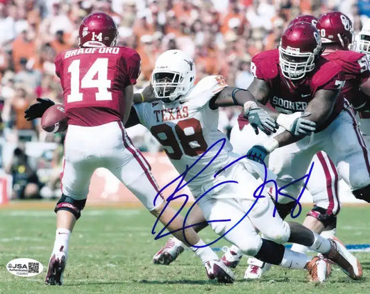 Autographed Oklahoma Sooners vs Texas Longhorns football action photo, NFL memorabilia collectible