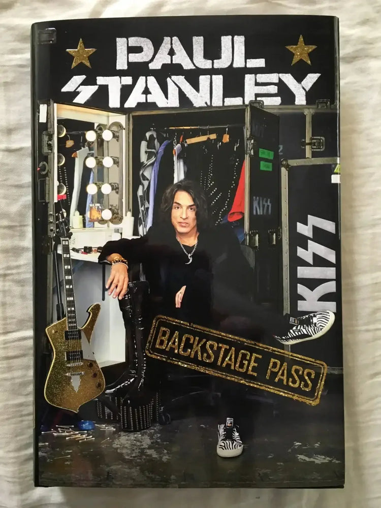 Paul Stanley signed KISS Backstage Pass 1st edition book - AutographsForSale.com