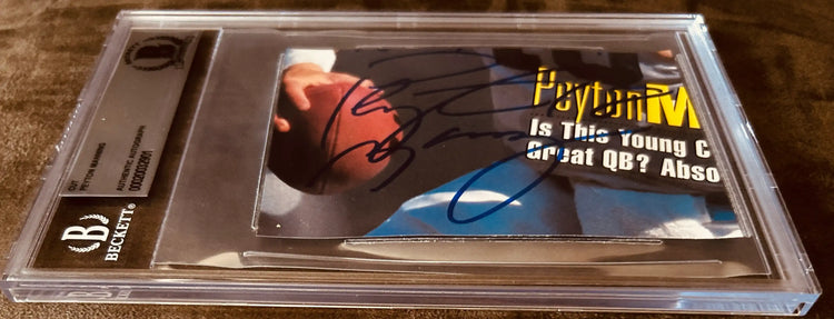 Peyton Manning signed cut autograph card in Beckett slab, NFL collectible memorabilia